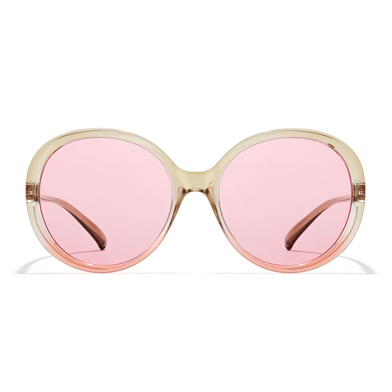 Round sunglasses with pink lenses and clear, light-colored frames.